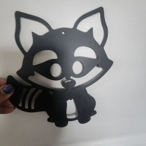Metal racoon decorative sign
